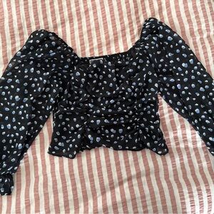 Back and blue blouse